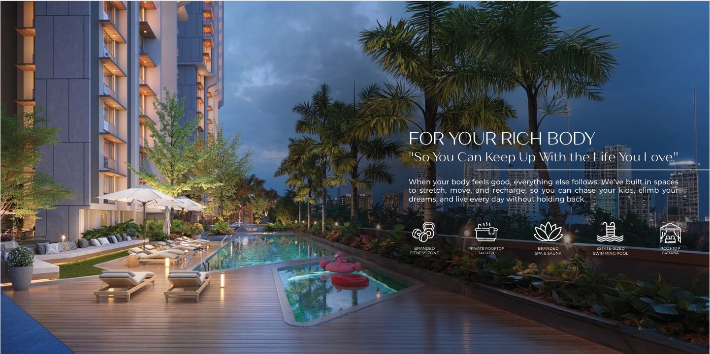 Designer pool deck with ambient lighting and skyline views at Sheetal Skytower, Andheri West